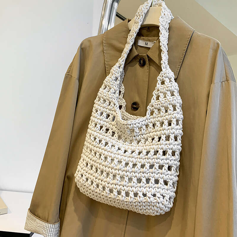 Large capacity commuting hand woven cotton thread hollow armpit bag, forest style vacation shopping bag, single shoulder handheld, dual-use for daily 