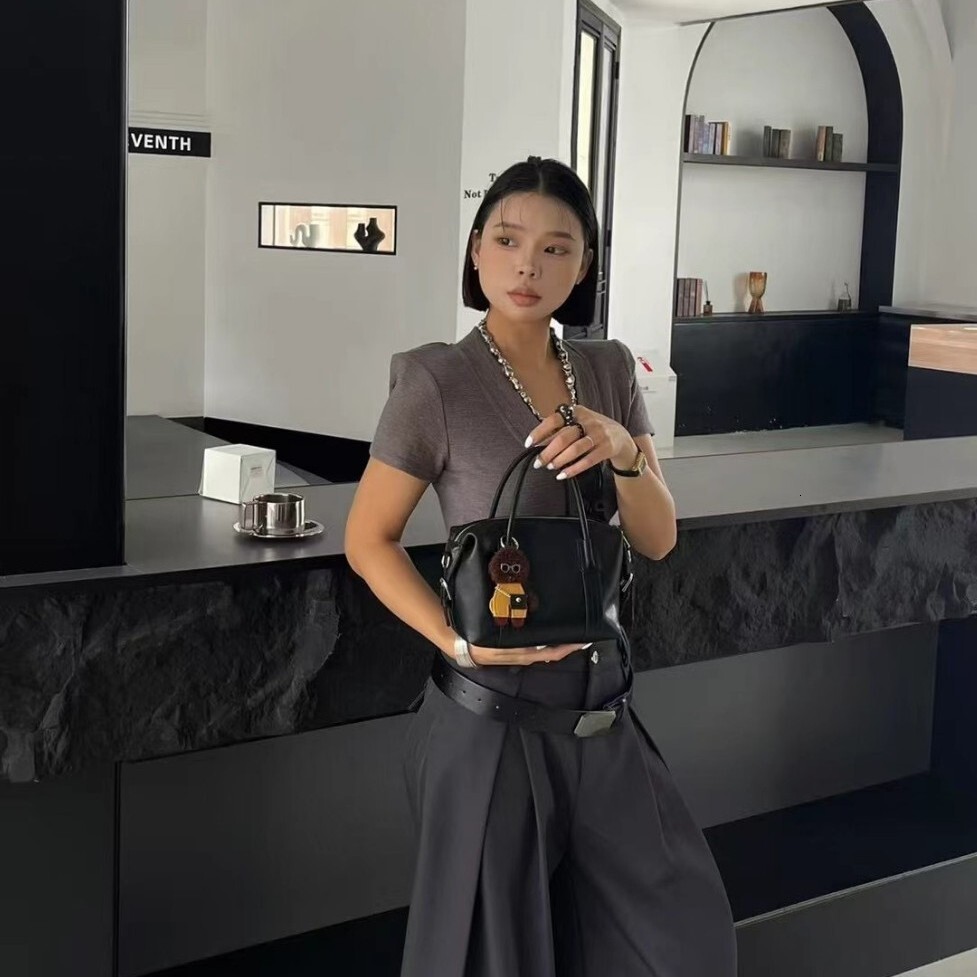 Free shipping designer bag 2025 Minimalist Boston Retro Handbag New Trendy Versatile Bag Fashion Bowling Ball Pillow Shoulder Bag Crossbody Bag