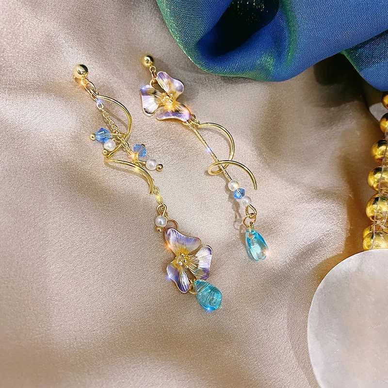 New Trend Cute Flower Asymmetrical Spiral Dangle Earrings for Women Charm Long Tassel Blue Crystal Drop Earrings Wedding Jewelry XJ250722