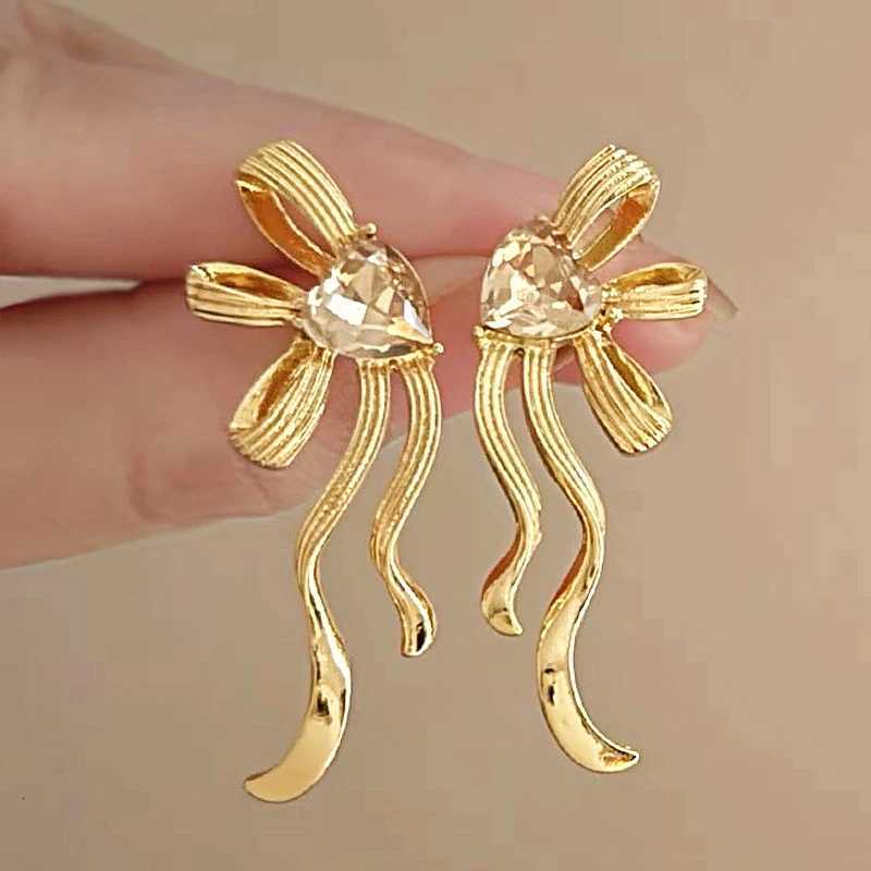 New Trend Waved Bowknot Dangle Earrings for Women Metal Tassel Statement Long Drop Earrings Womens Earrings 2024 XJ250722