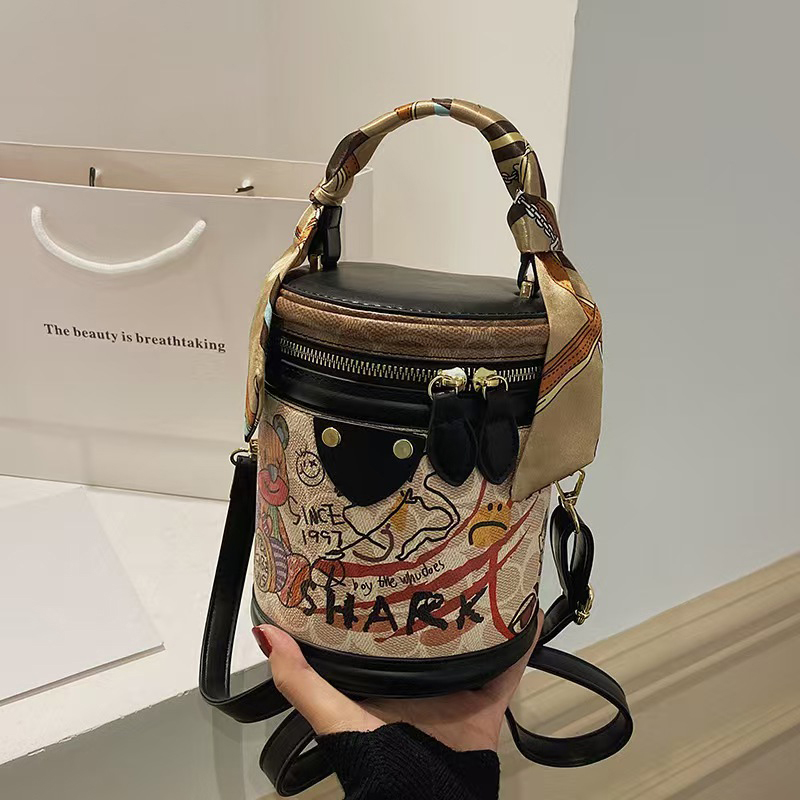 The hottest Designer Bag Shoulder Bag Luxury Bag Crossbody Purse Designer temperament graffiti cylindrical everything stylish single shoulder crossbod