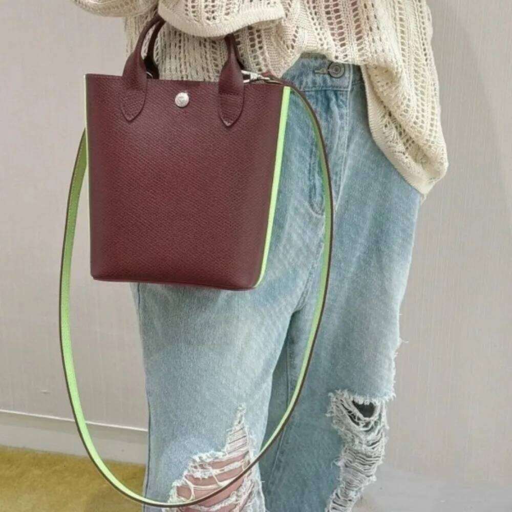 high-quality new cowhide mini tote bag, color blocking and contrasting handbag, hand-held bucket, women's bag