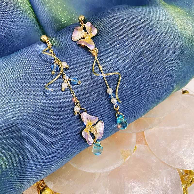 New Trend Cute Flower Asymmetrical Spiral Dangle Earrings for Women Charm Long Tassel Blue Crystal Drop Earrings Wedding Jewelry XJ250722