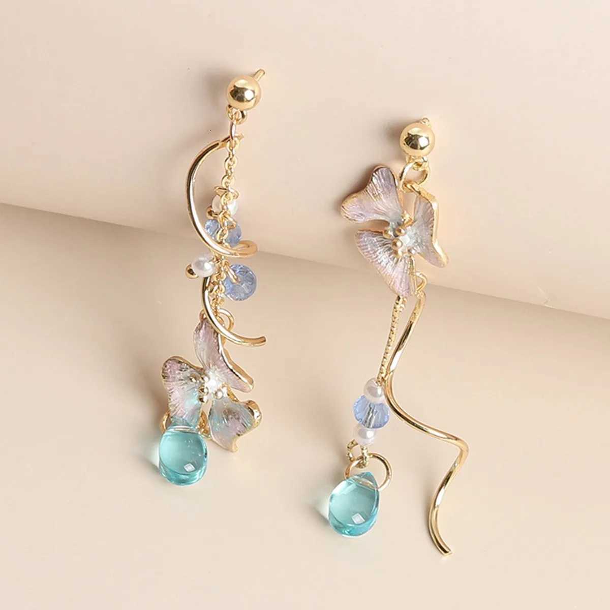 New Trend Cute Flower Asymmetrical Spiral Dangle Earrings for Women Charm Long Tassel Blue Crystal Drop Earrings Wedding Jewelry XJ250722