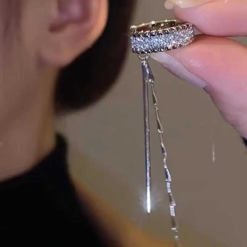 2025 New Fashion Zircon Shining C She Long Tassel Ear Cuff No Piercing Earrings Female Simple Design Ear Clip Party Jewelry XJ250722