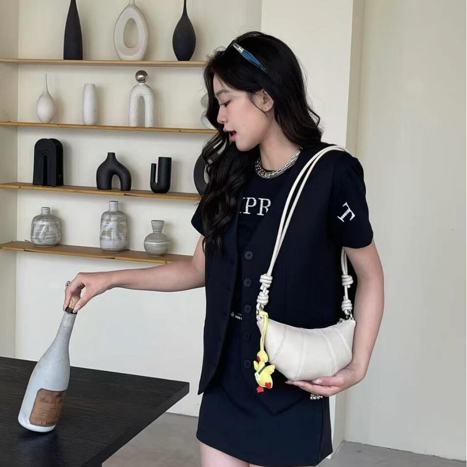 Free shipping designer bag 2025 Niche Fashionable Solid Color Horn Bag For Women New Simple Versatile Bag Shoulder Bag Crossbody Bag