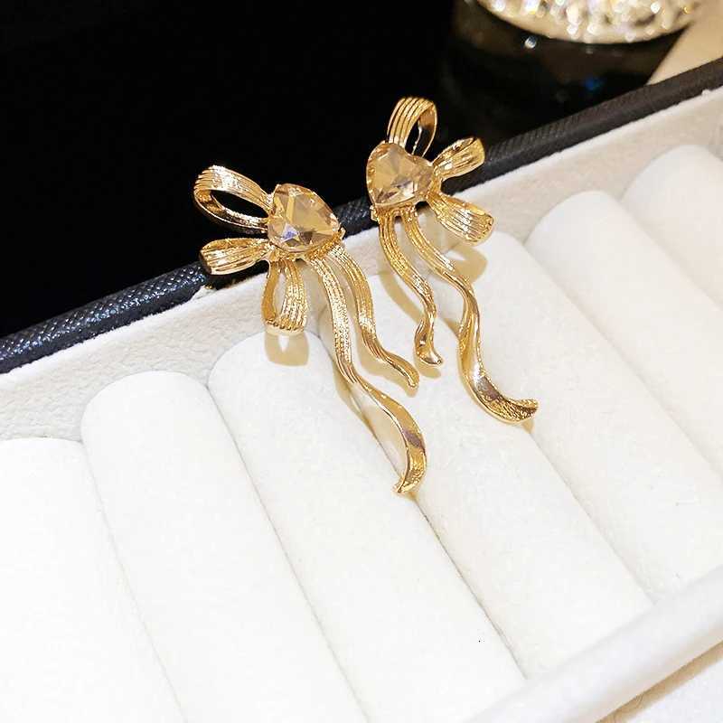 New Trend Waved Bowknot Dangle Earrings for Women Metal Tassel Statement Long Drop Earrings Womens Earrings 2024 XJ250722
