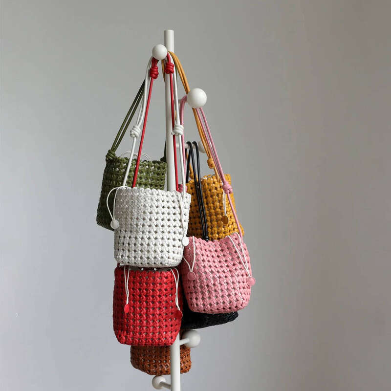 2025 New Niche Vintage French Genuine Leather Woven Cowhide Hollow Mini Women Handbag Shoulder Crossbody Bucket Bag