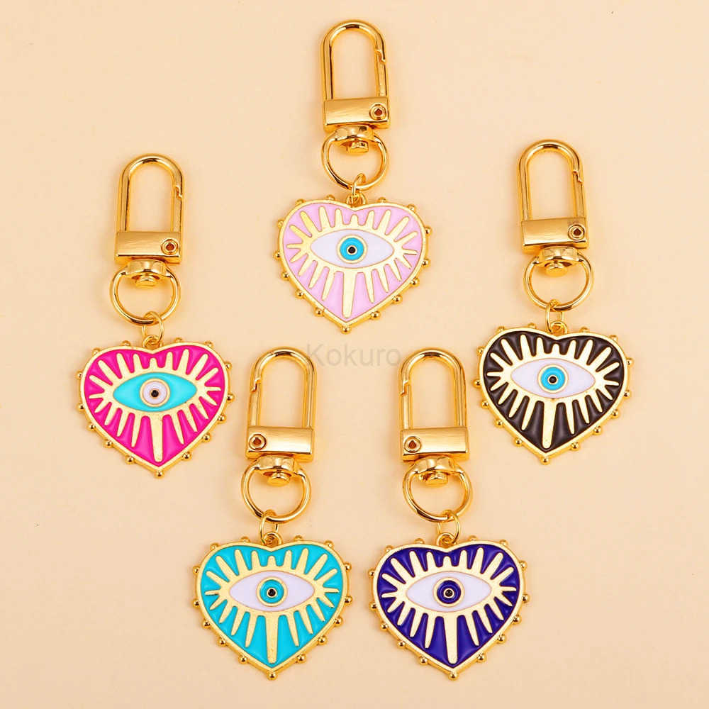 2Pcs Alloy Key Chains Rotatable Clasp Keyring Evil Blue Eye Love Heart Pendant Keychain for Women Car Key Bag Decoration Accessory M250723