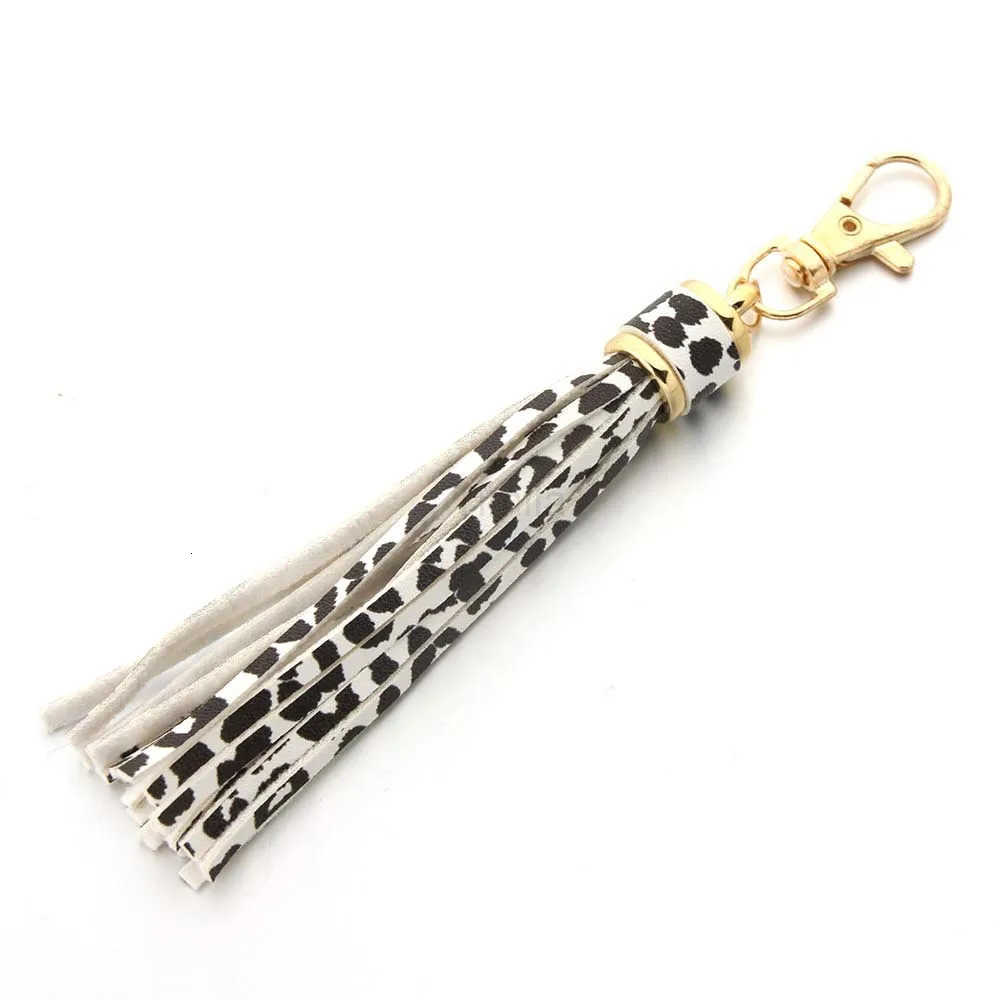 Hot selling copper alloy lobster clasp leather tassel pendant keychain bag accessories for women U250723