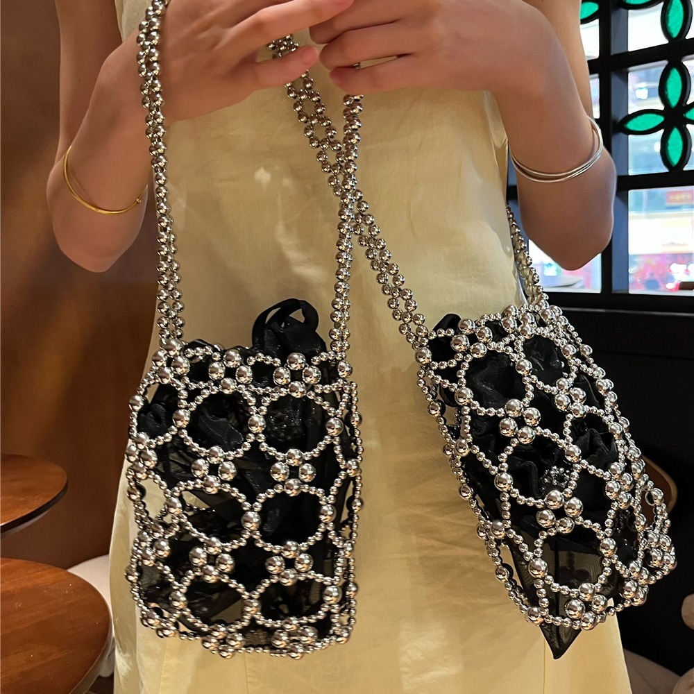 2025 Summer new women's shoulder bag new fashion niche solid women's color handmade retro small round bead hollow weave women's handbag