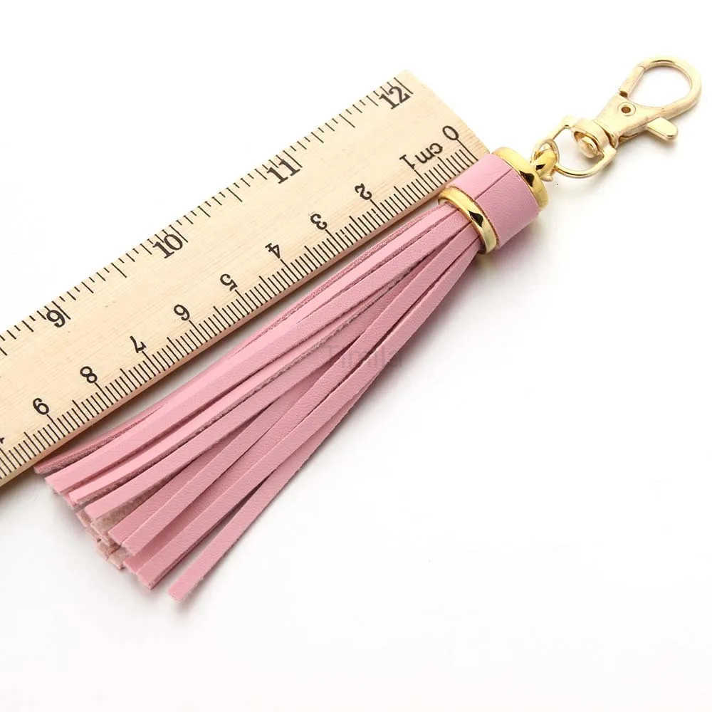 Hot selling copper alloy lobster clasp leather tassel pendant keychain bag accessories for women U250723