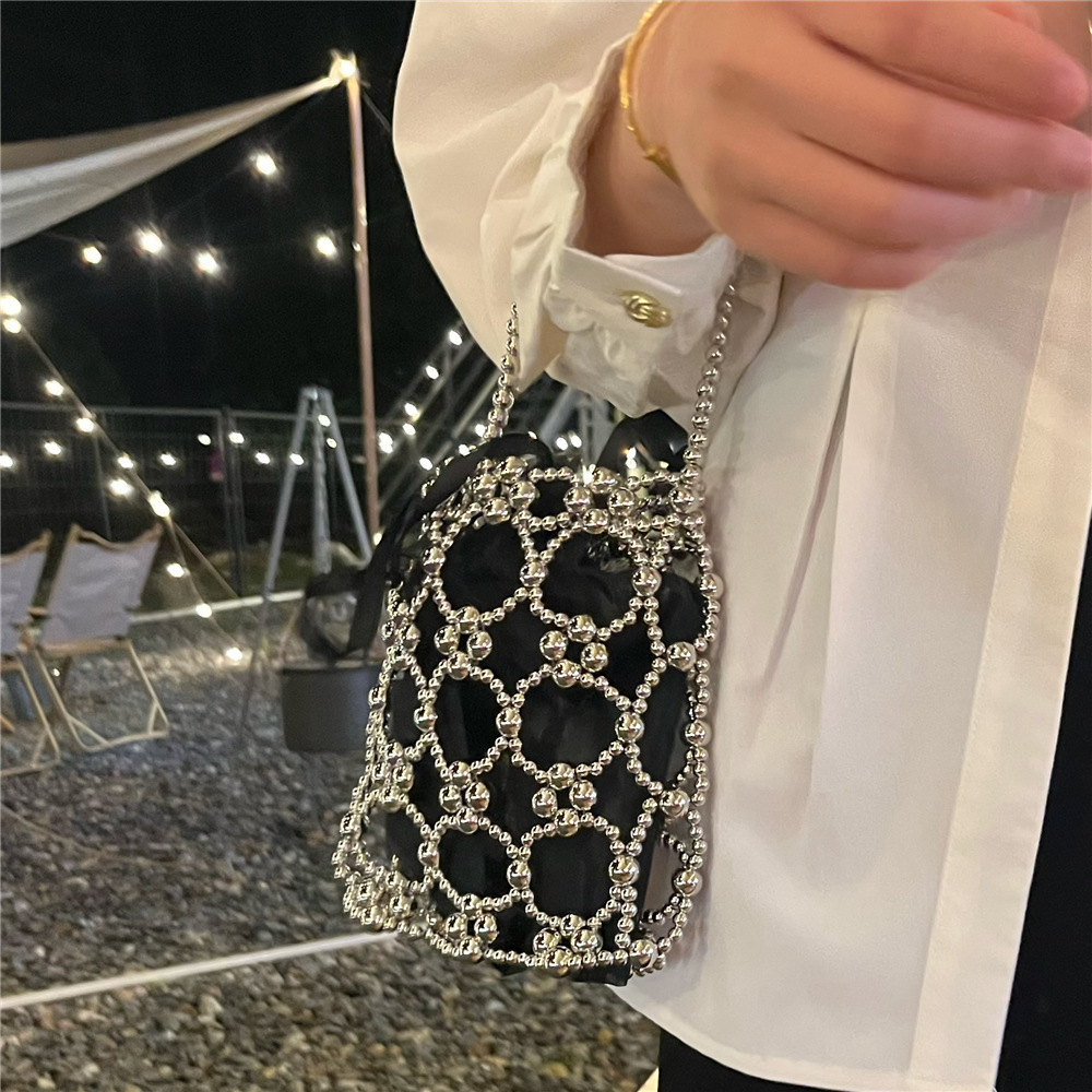 2025 Summer new women's shoulder bag new fashion niche solid women's color handmade retro small round bead hollow weave women's handbag