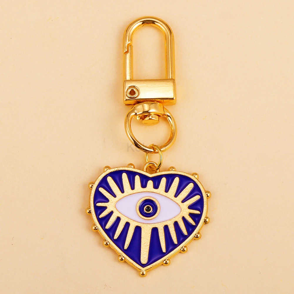 2Pcs Alloy Key Chains Rotatable Clasp Keyring Evil Blue Eye Love Heart Pendant Keychain for Women Car Key Bag Decoration Accessory M250723