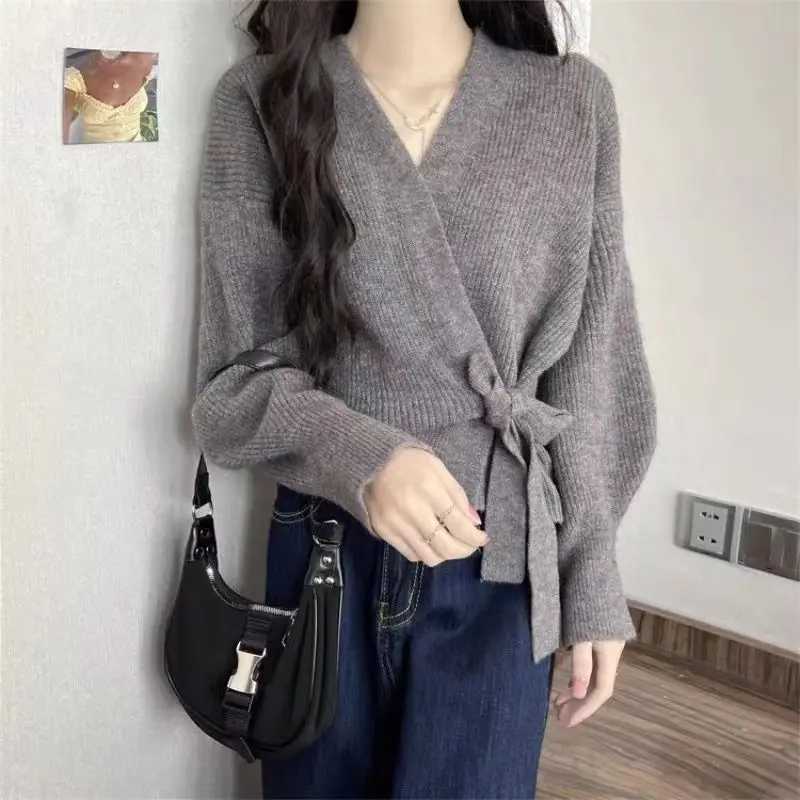 Cross-shaped irregular strap waist slimming sweater cardigan for women in autumn and winter chic lantern sleeve loose knit sweater X250724