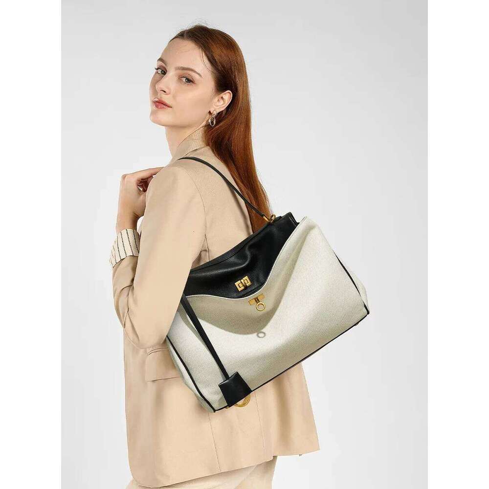 High-End Rodeobag Canvas Cowhide Women's Tote Bag Large Capacity Niche Armpit Design for Commuting Stylish And Practical