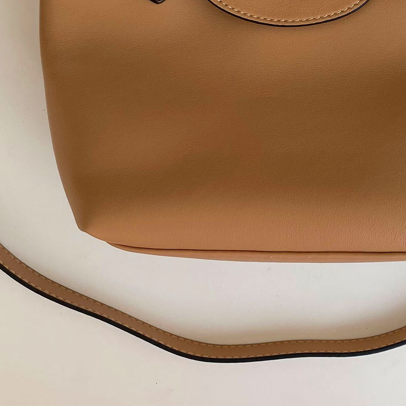 Top brand high-quality new free designer bag dumpling leather mini hand-held shoulder women's bag brand new free designer bag