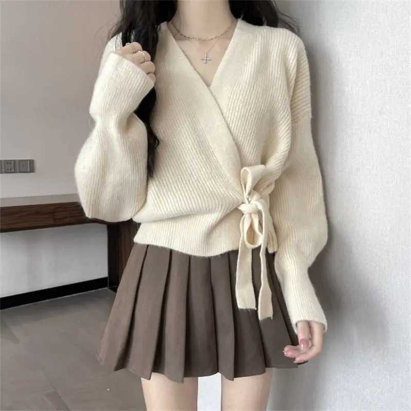 Cross-shaped irregular strap waist slimming sweater cardigan for women in autumn and winter chic lantern sleeve loose knit sweater X250724