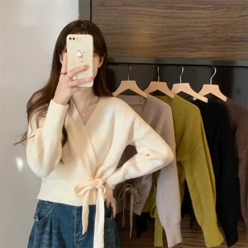 Cross-shaped irregular strap waist slimming sweater cardigan for women in autumn and winter chic lantern sleeve loose knit sweater X250724