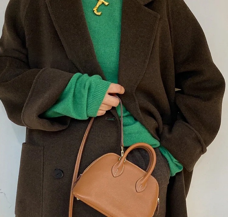 High-quality designer crossbody bag - handmade pure leather handbag. Small high-end bowling bag made of leather for women's crossbody bag.