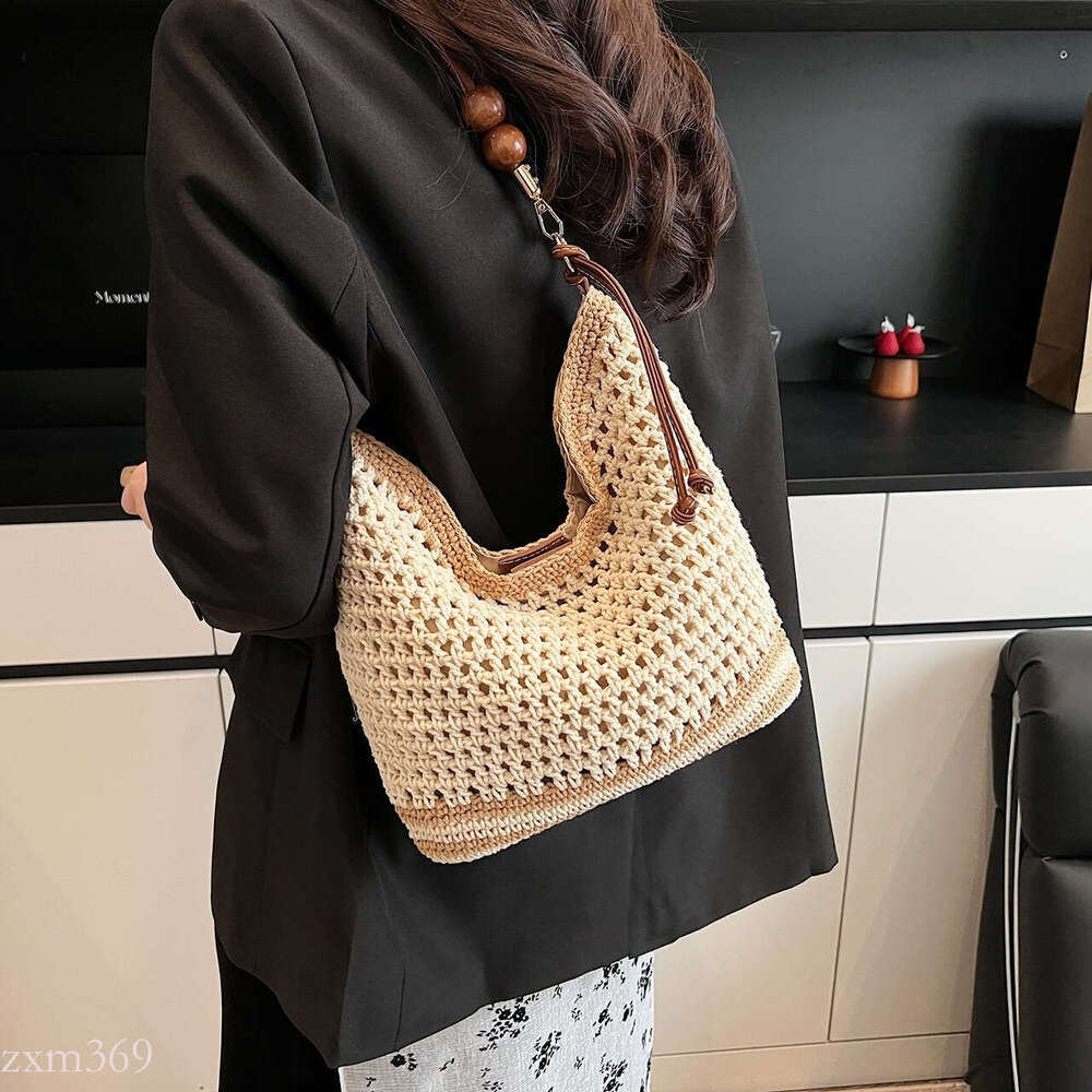 Beach Vacation Woven Women's 2025 Summer New Commuter Shoulder Crossbody Hollow Handheld Tote Bag