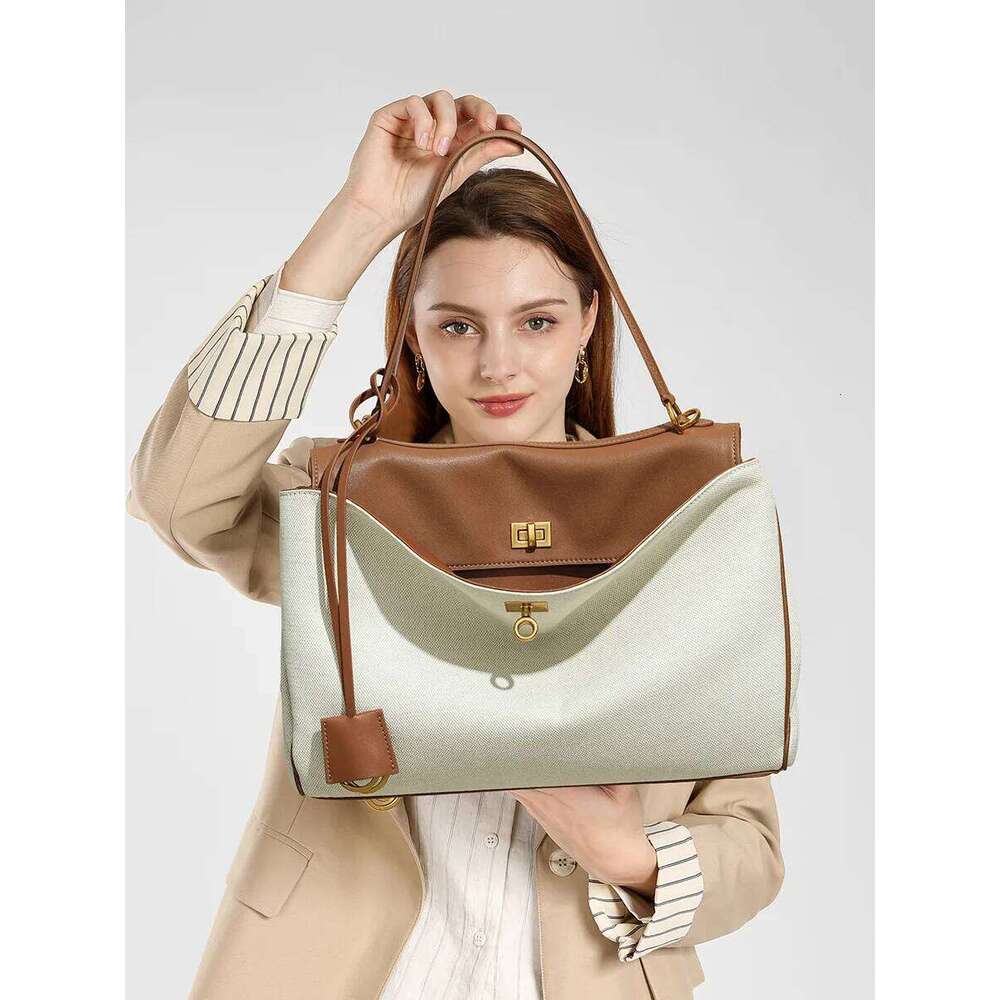 High-End Rodeobag Canvas Cowhide Women's Tote Bag Large Capacity Niche Armpit Design for Commuting Stylish And Practical