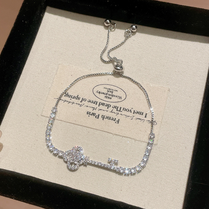 Gold Tone Key Shaped Slider Bracelet Pave Crystal Accents Elegant Party Jewelry And Daily Wear Gift For Her High Quality And Stylish Jewelry