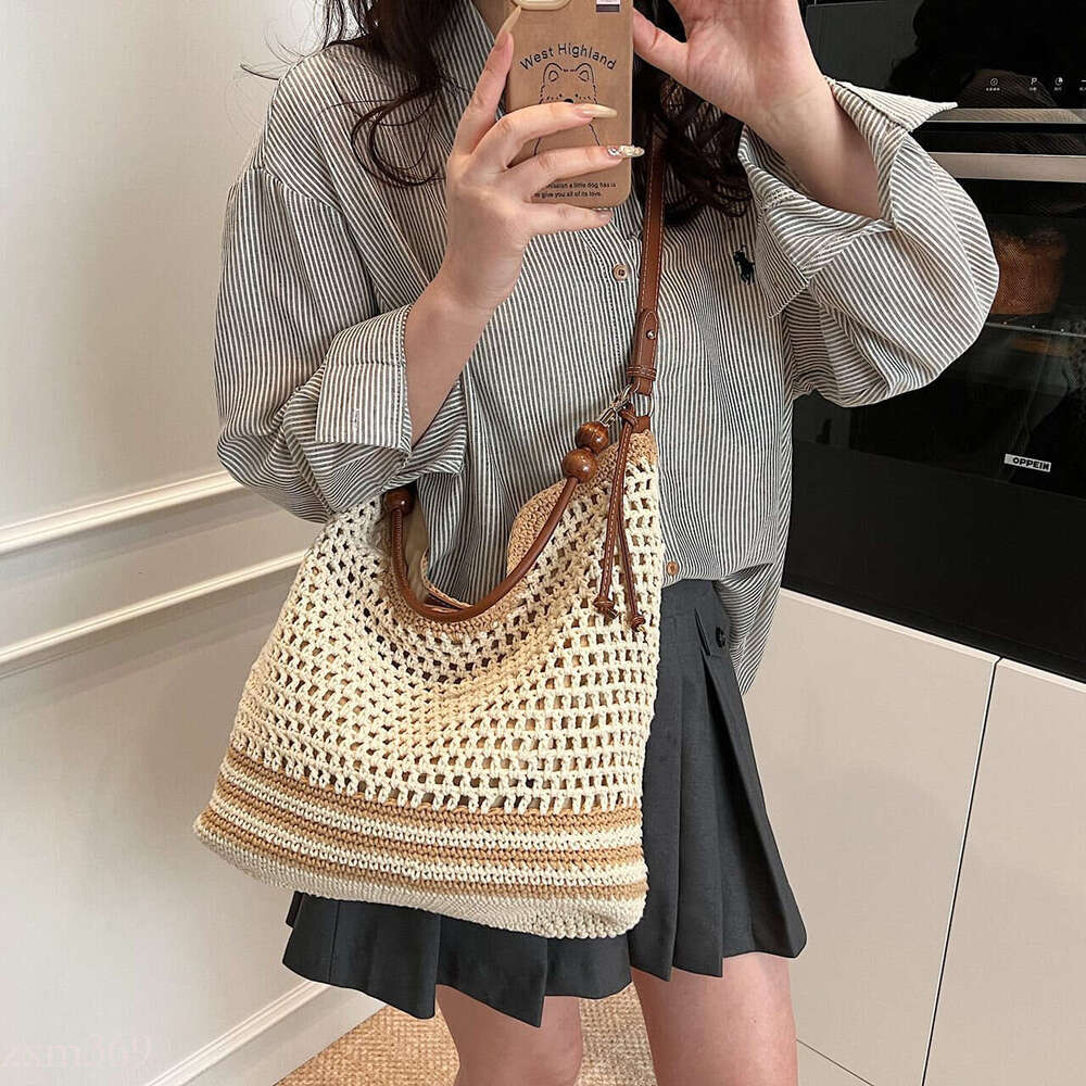 Beach Vacation Woven Women's 2025 Summer New Commuter Shoulder Crossbody Hollow Handheld Tote Bag