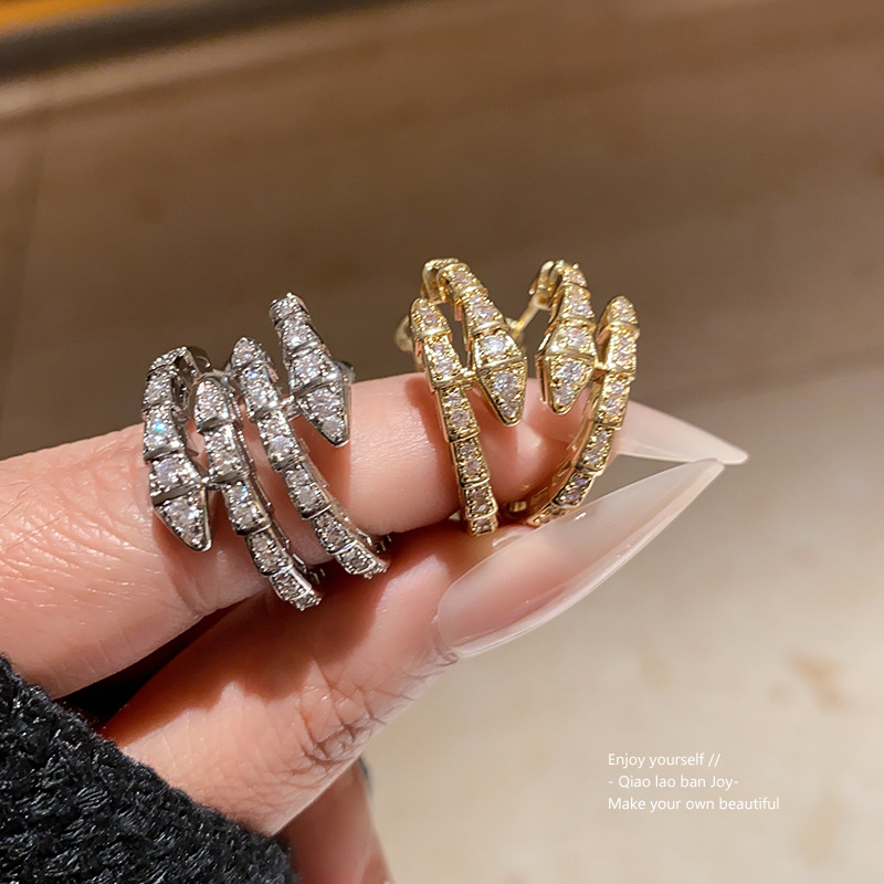 Gold Tone Snake Shaped Hoop Earrings Crystal Pave Accents Edgy Party Jewelry And Gift For Her High Quality And Stylish Jewelry