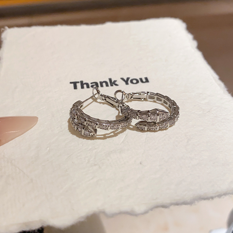 Gold Tone Snake Shaped Hoop Earrings Crystal Pave Accents Edgy Party Jewelry And Gift For Her High Quality And Stylish Jewelry