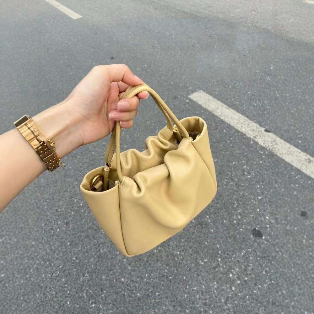 2025 New Soft Leather Cloud Pleated Small Handbag Women's Tote Basket Niche High-end Commuter Crossbody Bag