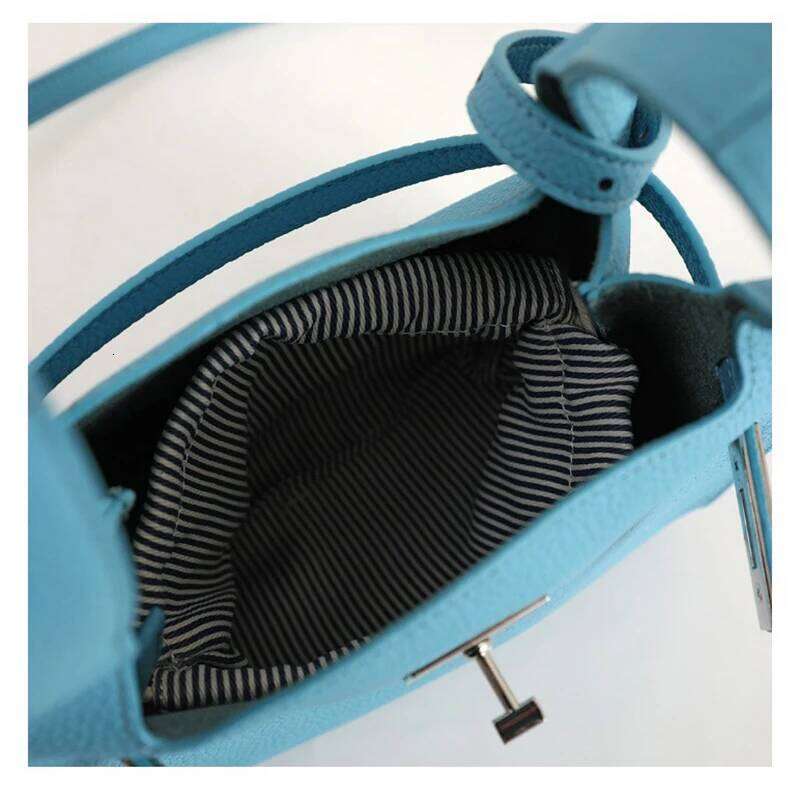 New women's first layer vegetable basket garbage one shoulder crossbody underarm bucket bag commuting cowhide