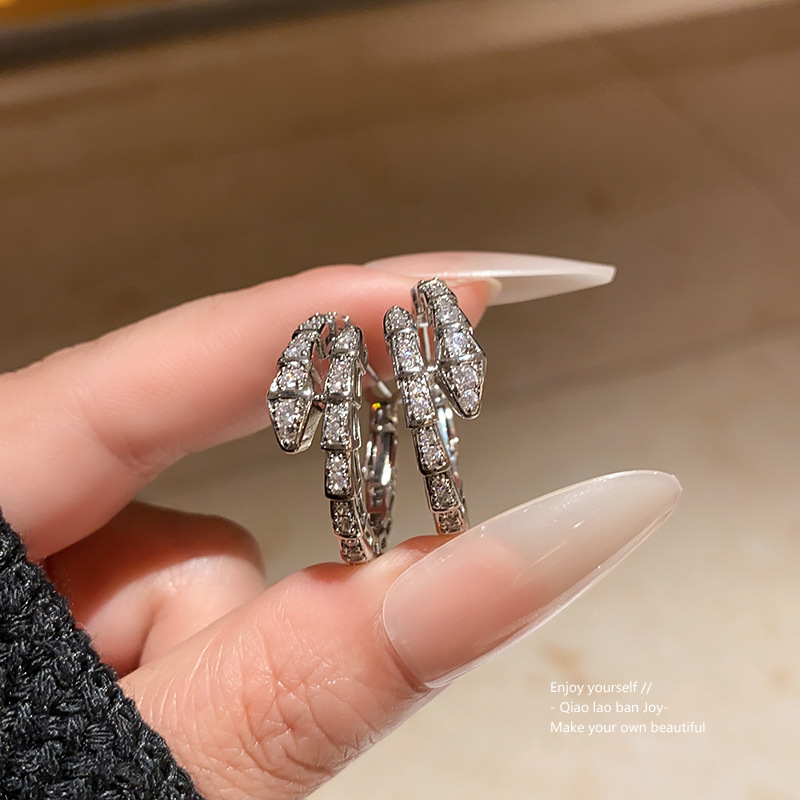 Gold Tone Snake Shaped Hoop Earrings Crystal Pave Accents Edgy Party Jewelry And Gift For Her High Quality And Stylish Jewelry