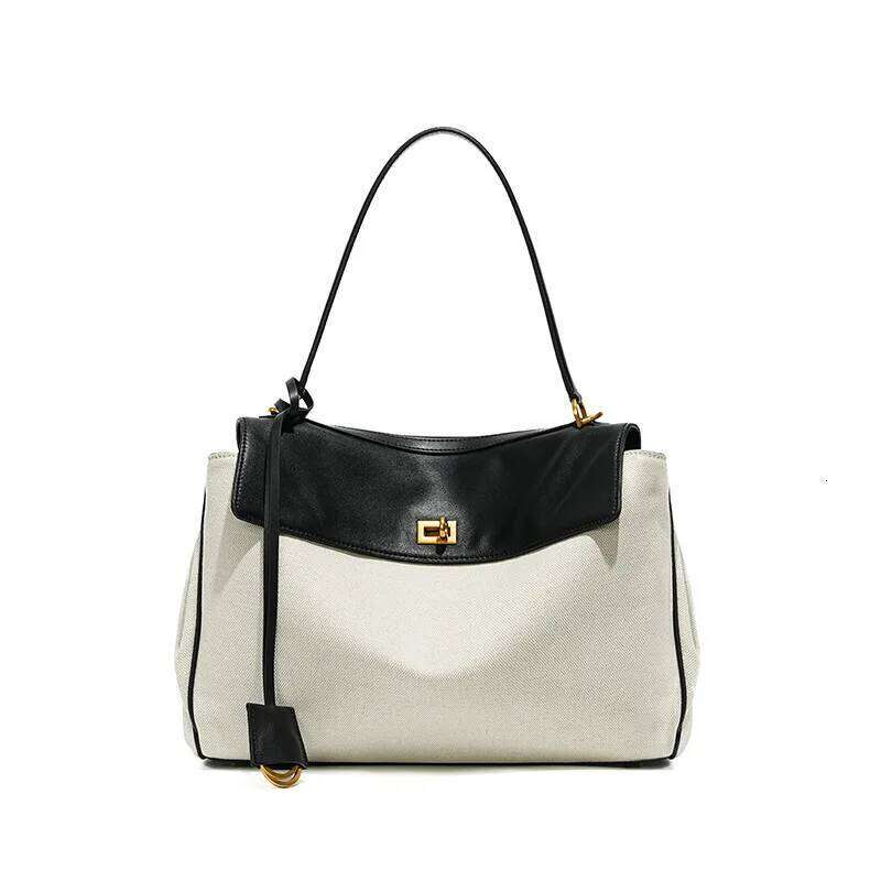 High-End Rodeobag Canvas Cowhide Women's Tote Bag Large Capacity Niche Armpit Design for Commuting Stylish And Practical