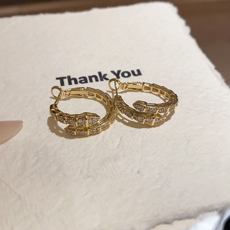 Gold Tone Snake Shaped Hoop Earrings Crystal Pave Accents Edgy Party Jewelry And Gift For Her High Quality And Stylish Jewelry