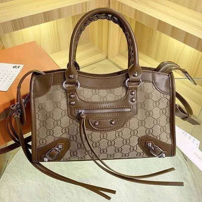 spring new general-purpose women's large fabric/coated woven mobile phone soft handle youth locomotive bag full