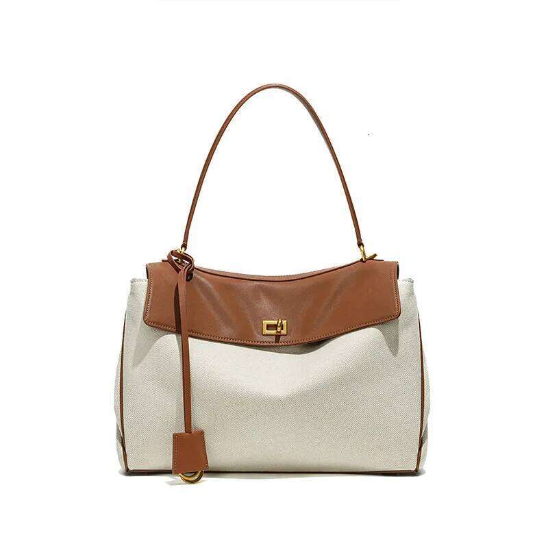 High-End Rodeobag Canvas Cowhide Women's Tote Bag Large Capacity Niche Armpit Design for Commuting Stylish And Practical