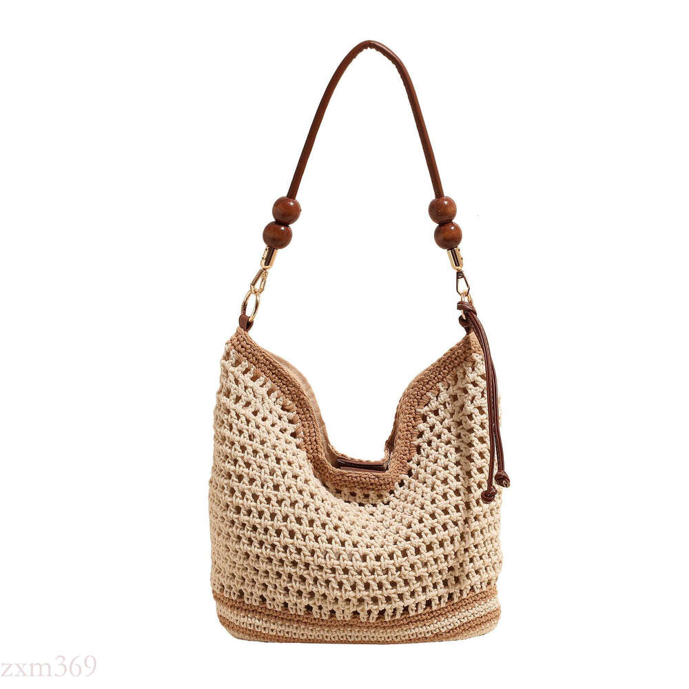 Beach Vacation Woven Women's 2025 Summer New Commuter Shoulder Crossbody Hollow Handheld Tote Bag