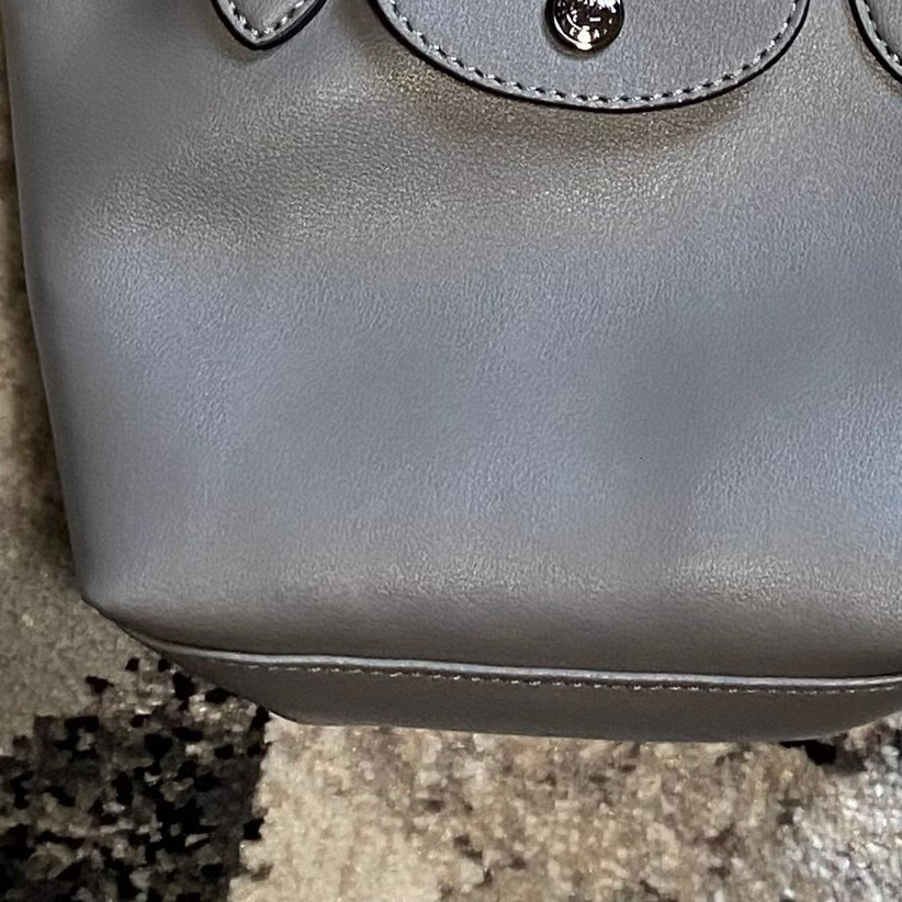 Top brand high-quality new free designer bag dumpling leather mini hand-held shoulder women's bag brand new free designer bag