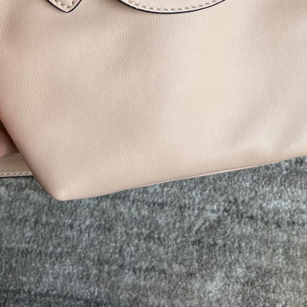 Top brand high-quality new free designer bag dumpling leather mini hand-held shoulder women's bag brand new free designer bag
