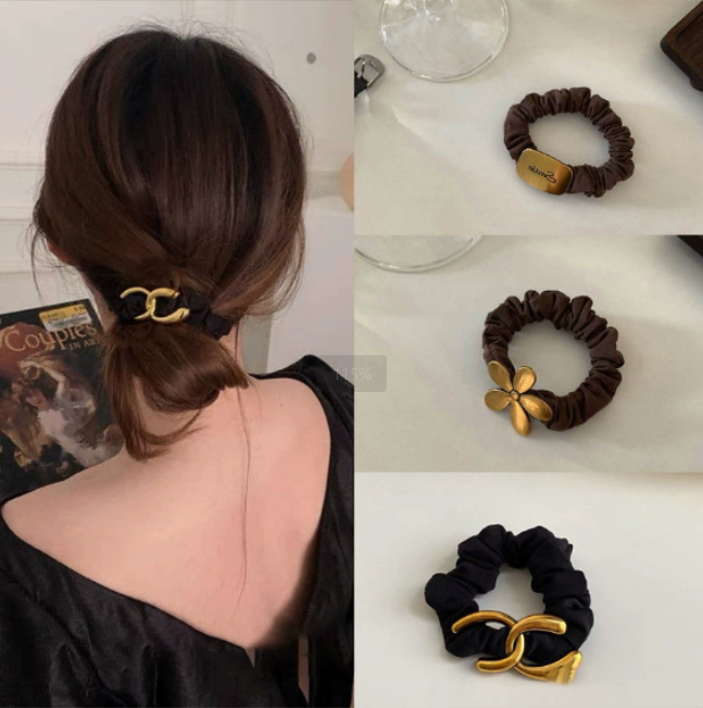Wholesale Korean-style hair bands handcrafted alloy small black intestinal bands flower hair ties lazy hair ties and hair accessories from Yiwu