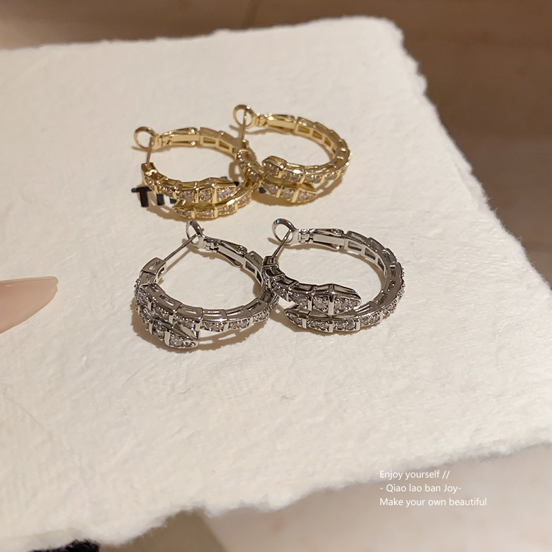 Gold Tone Snake Shaped Hoop Earrings Crystal Pave Accents Edgy Party Jewelry And Gift For Her High Quality And Stylish Jewelry