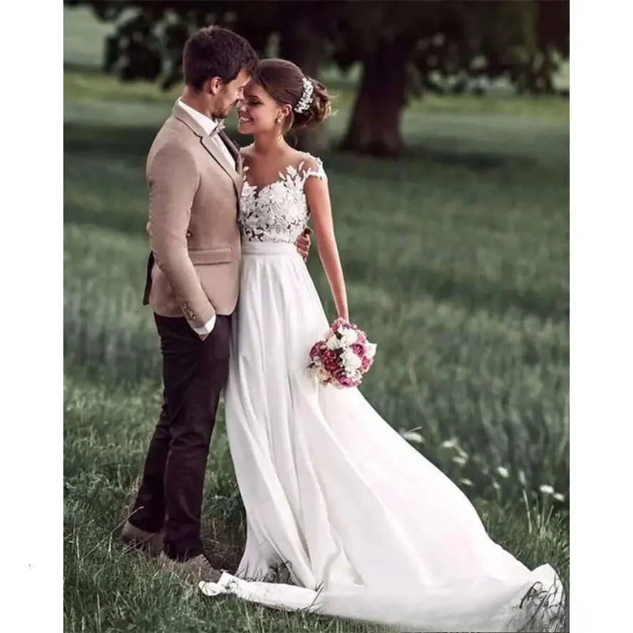 Capped Dresses A 2025 Chiffon Newest E Sleeves Covered Buttons Illusion Lace Applique Country Wedding Bride Gown Vestido De Novia Pplique pplique