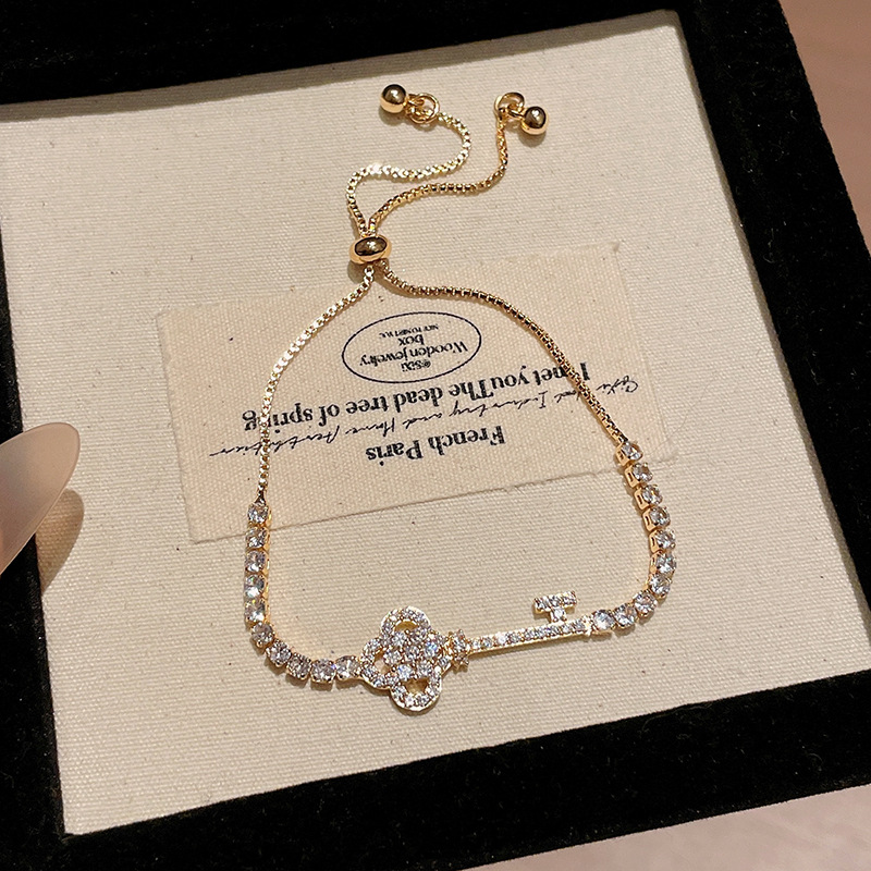 Gold Tone Key Shaped Slider Bracelet Pave Crystal Accents Elegant Party Jewelry And Daily Wear Gift For Her High Quality And Stylish Jewelry