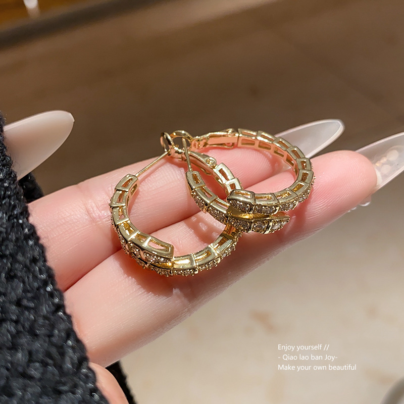 Gold Tone Snake Shaped Hoop Earrings Crystal Pave Accents Edgy Party Jewelry And Gift For Her High Quality And Stylish Jewelry