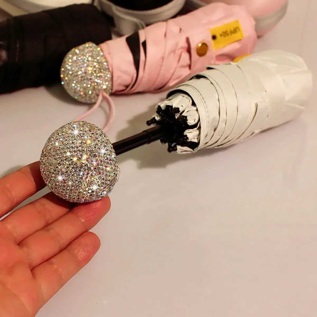 Luxury Rhinestone Portable Travel Capsule Umbrella Anti UV Sunscreen Folding Umbrella Girls Sunshine Umbrella Bling Rain Gear R250724