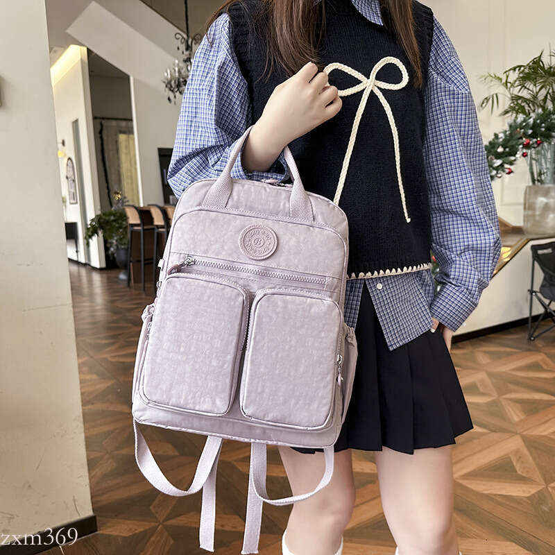 2025 New Fashion Versatile Multi-Pocket Lightweight Waterproof Casual Travel Backpack 14inch Laptop Bag