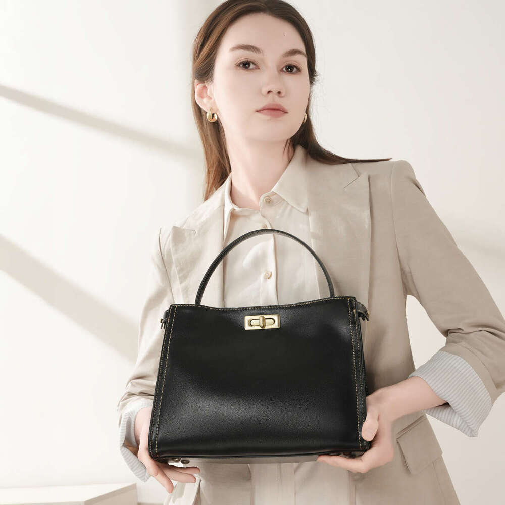 Cowhide Vintage Fashion Commuter new designer Light Luxury Handbag Simple High-end Single Shoulder Crossbody Women's Bag Versatile