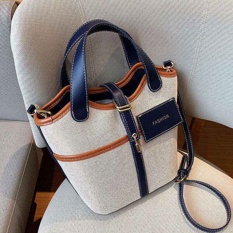 Retro Canvas PU Spliced Bucket 2024 New Women's Personalized Design Large Capacity Crossbody Bag Versatile Commuting Handbag