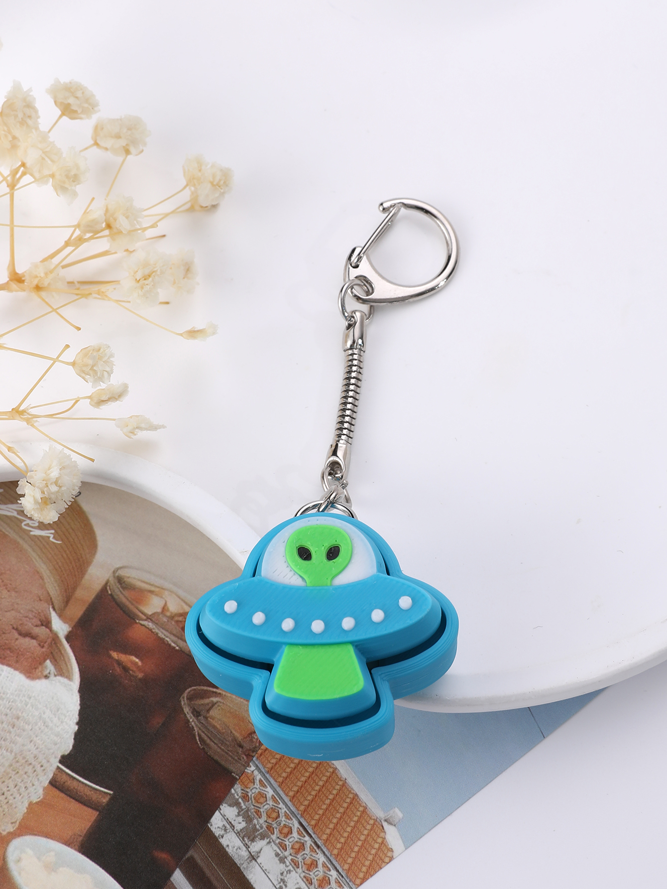 3D printed alien keychain - an adult stress relief toy with a portable anxiety-reducing gadget featuring a clickable keyboard design